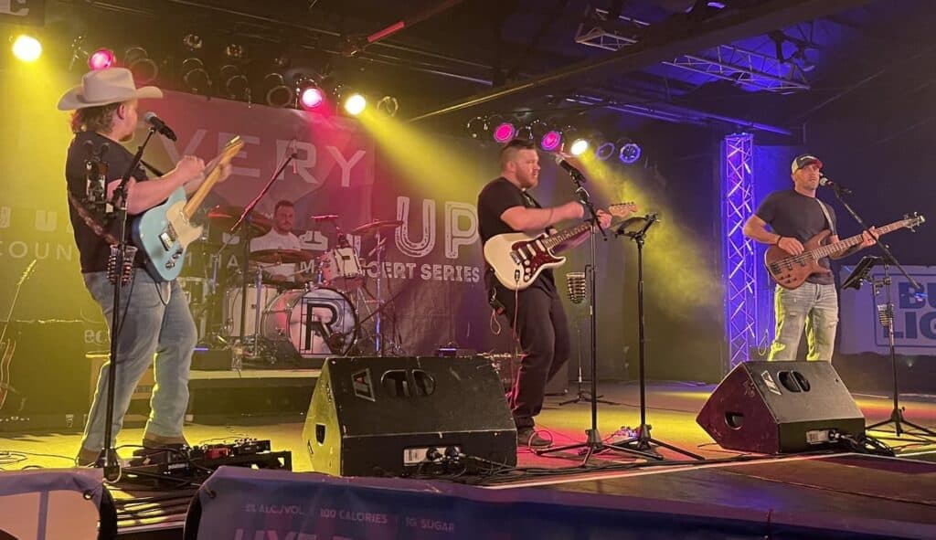 Revery performs on stage