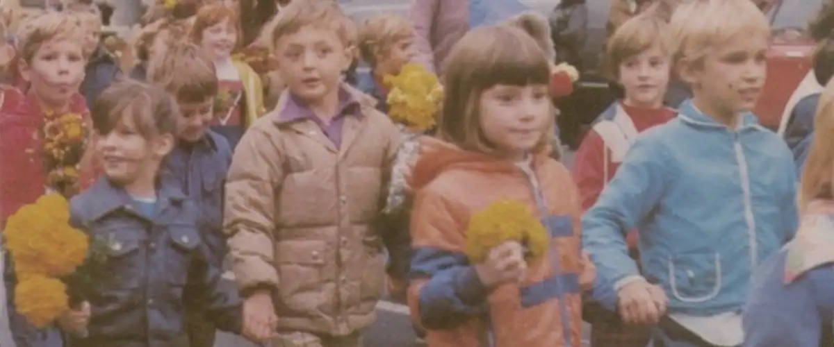 Future GCHS students bring their flowers to Riley's statue on the courthouse lawn. Greenfield H.S. Catamount Yearbook, 1978